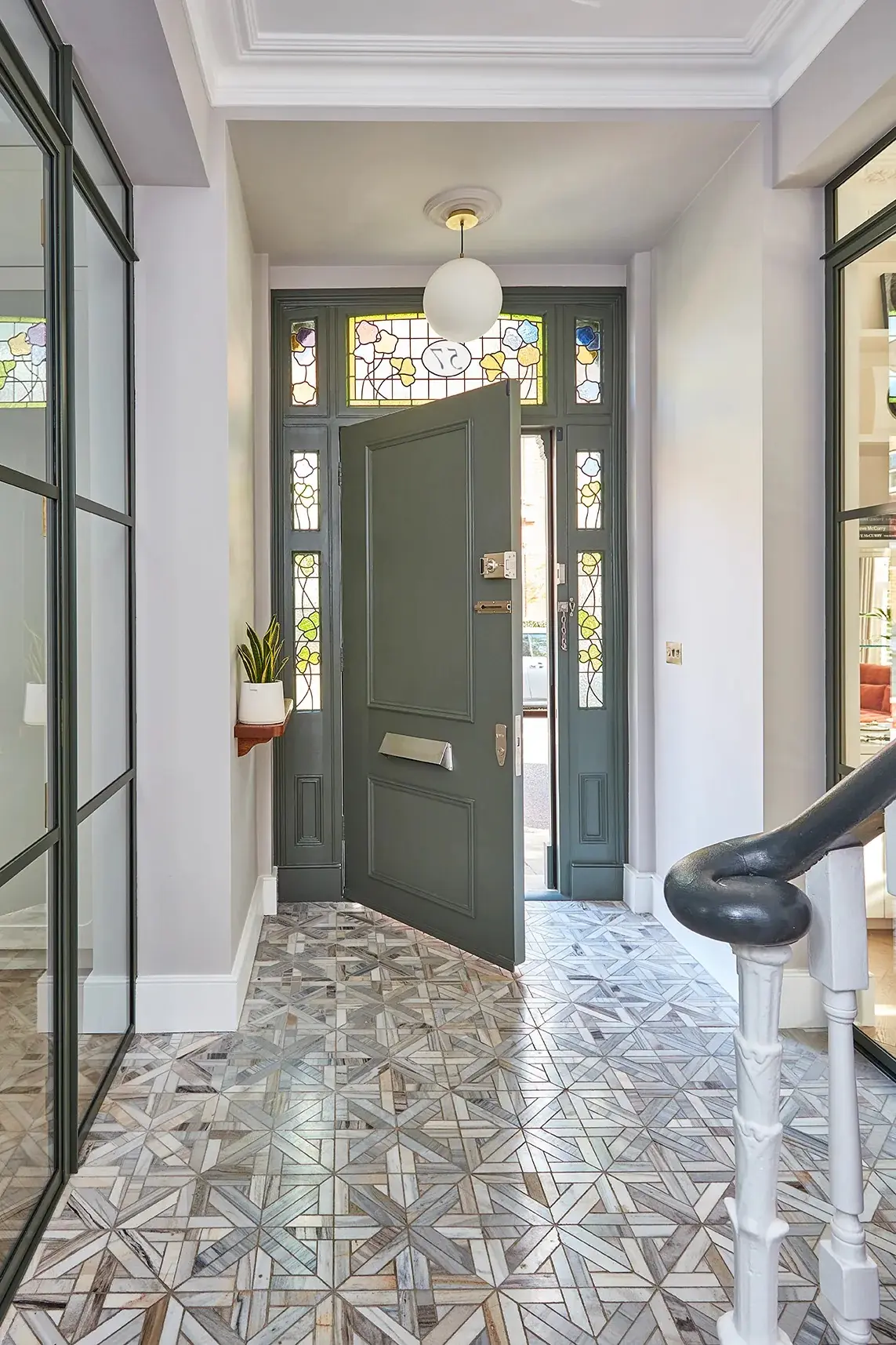 Entrance hall with stained-glass front door