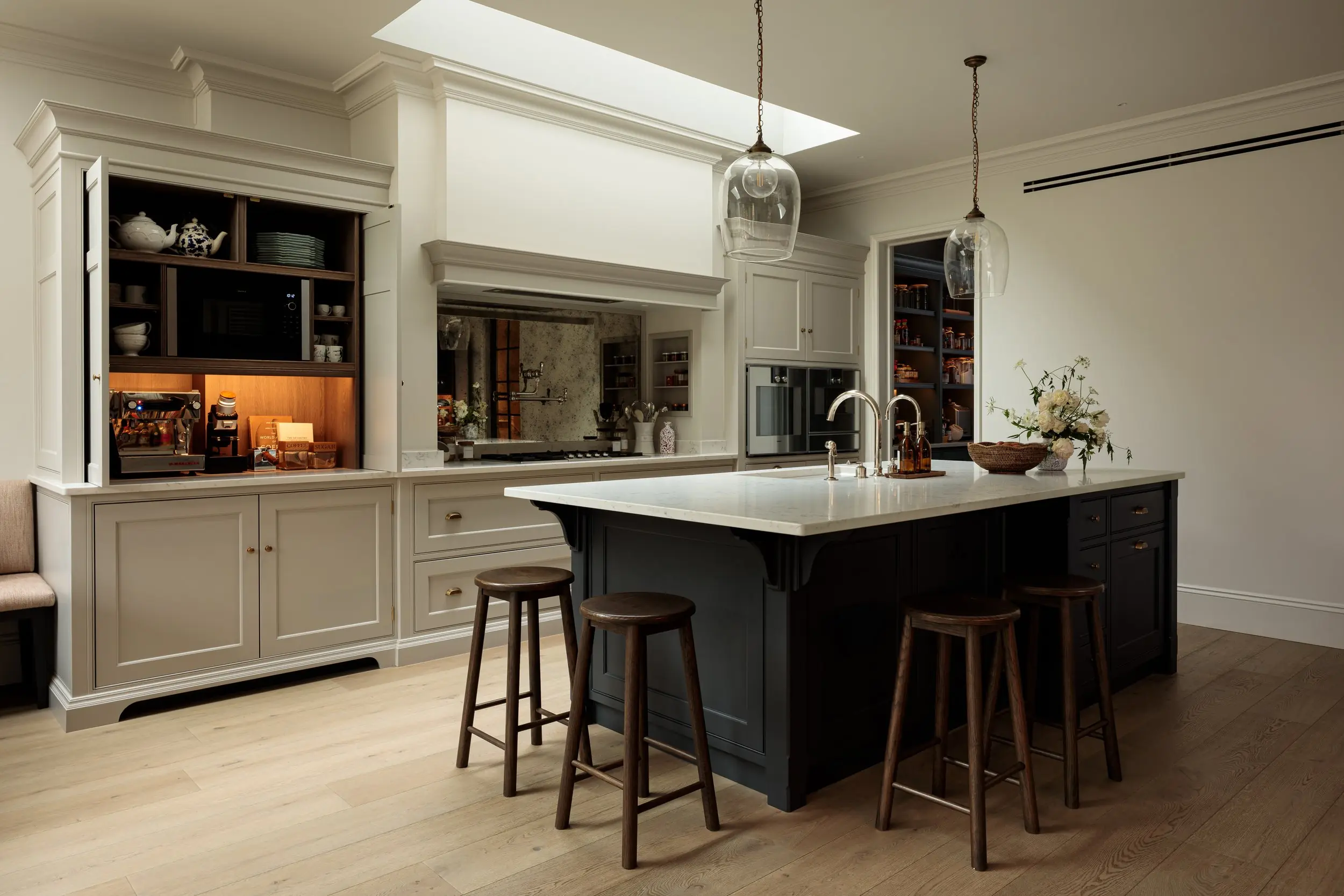 Kitchen island and dresser under the rooflight