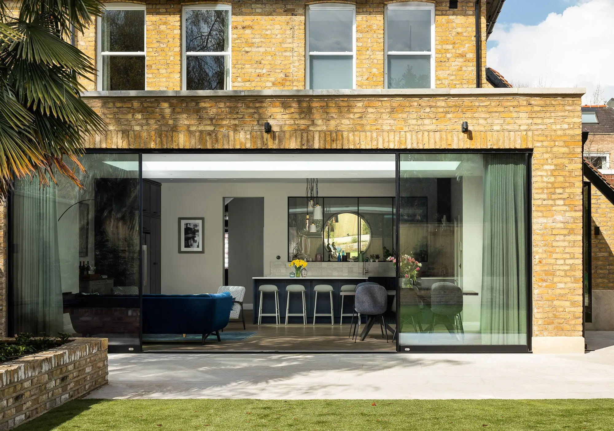 Rear extension and sliding doors from the garden