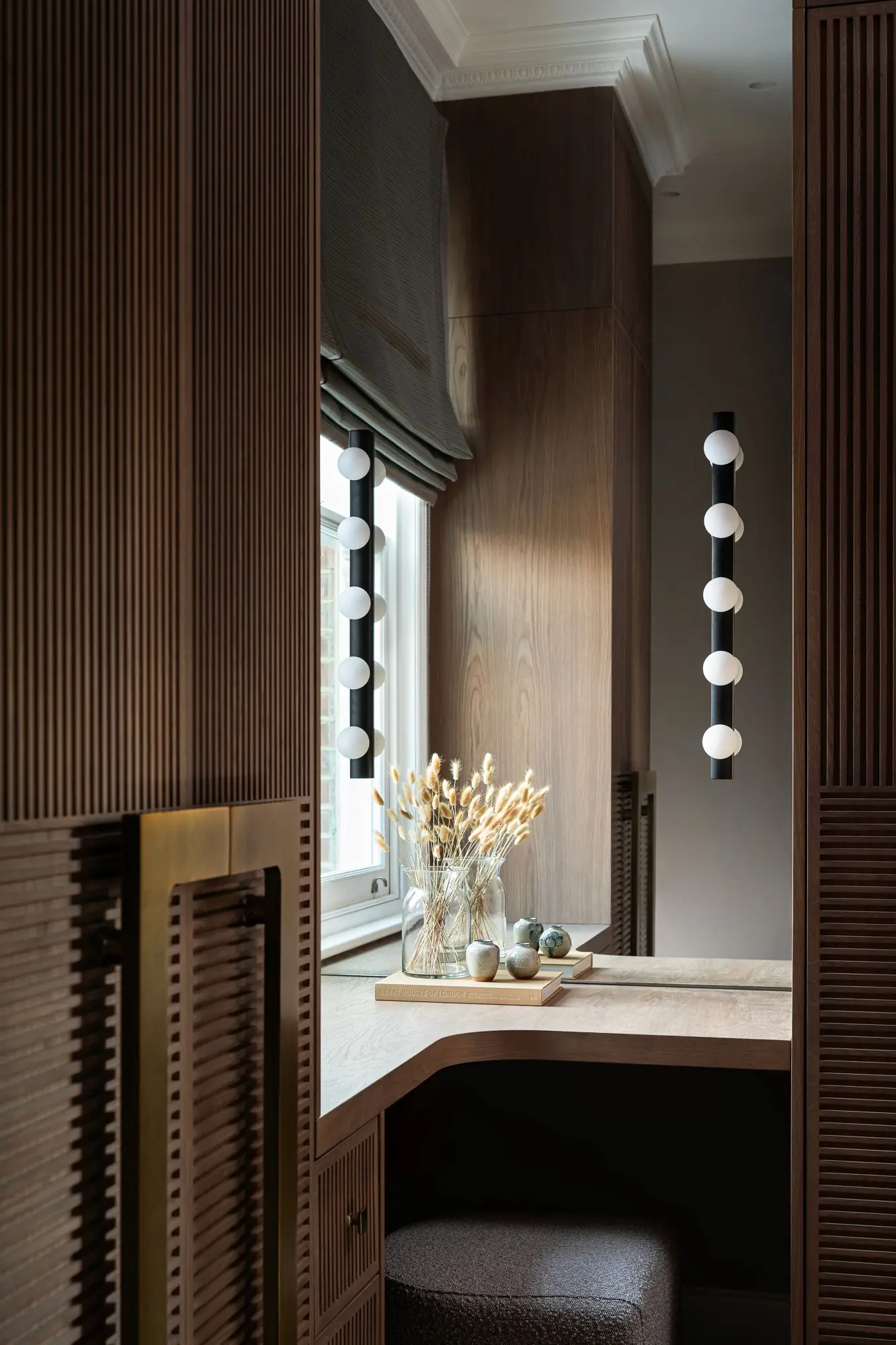 Fluted timber dressing area with stone top